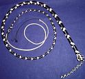 5ft Black 8 plait Classic American Bullwhip with Custom white accents on the thong, loop, and Knots